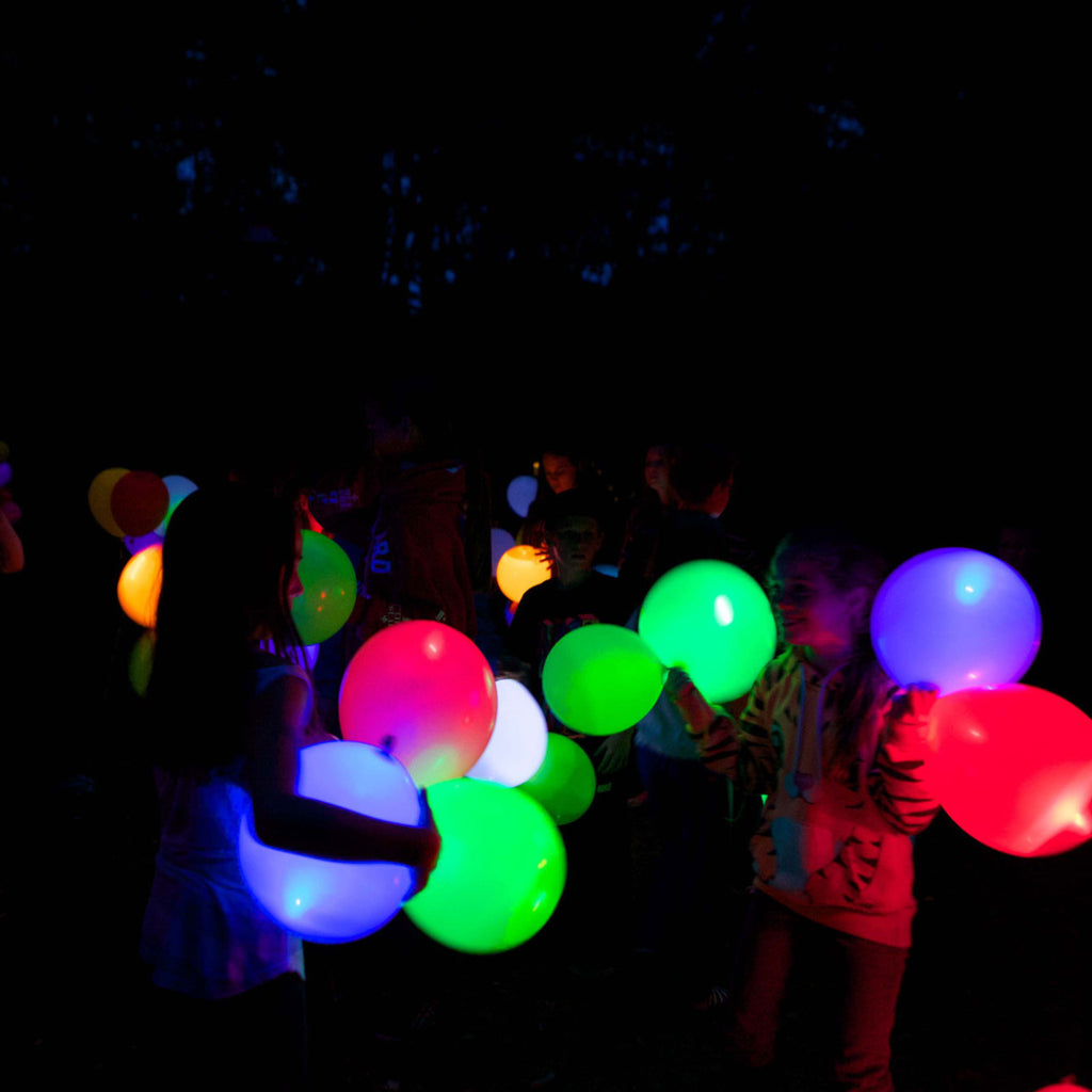 people with luminous Balloons