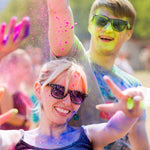 Load image into Gallery viewer, 2 persons with colored sunglasses at a colour run in canada
